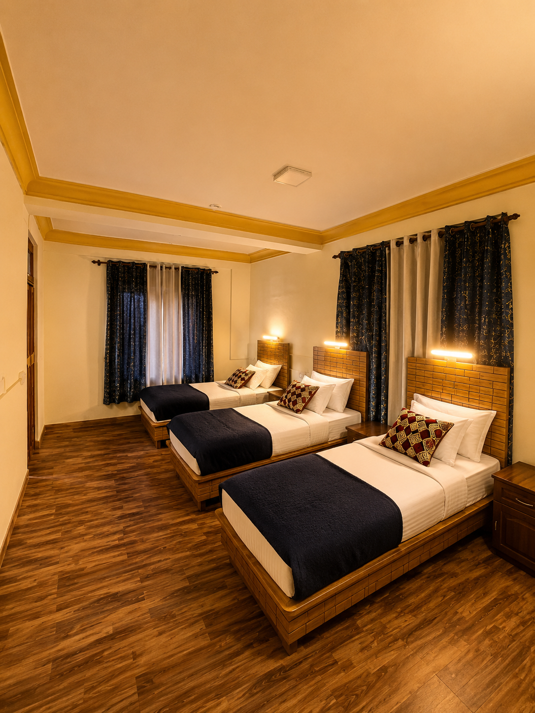 Shared dorm room with multiple beds, warm wood ceiling and curtained windows